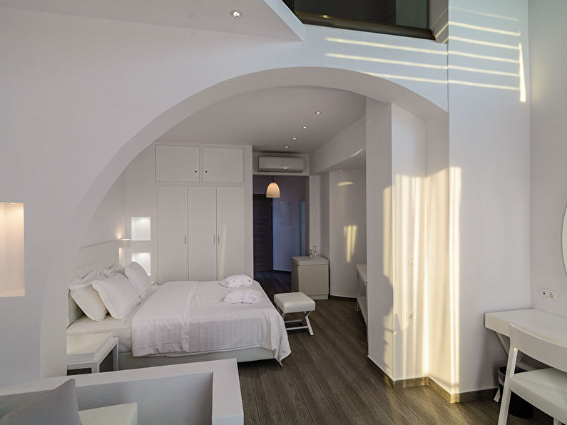 Arco redondo de placas de yeso en el dormitorio - diseño