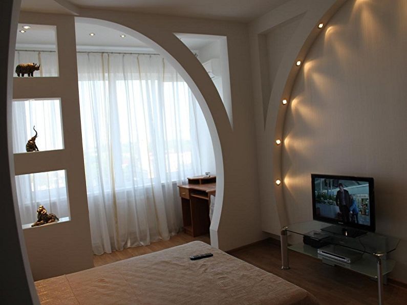 Arco decorativo de placas de yeso en el dormitorio - diseño