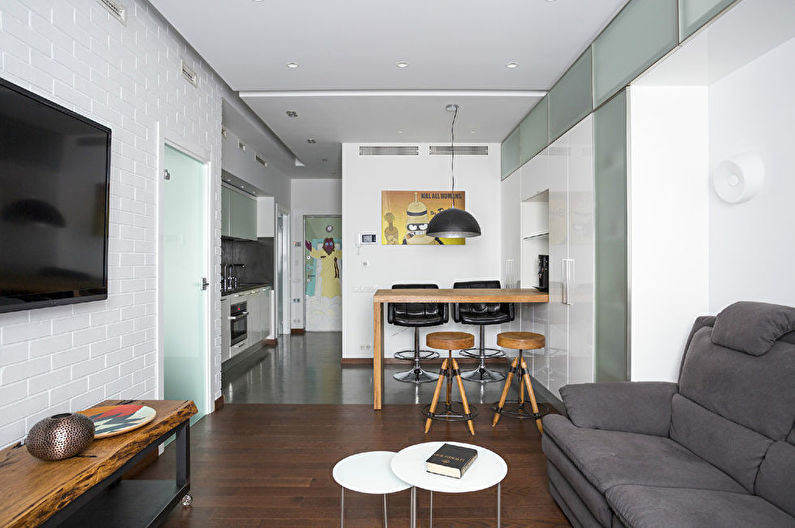 Amenajarea interioară a bucătăriei-sufragerie în alb - fotografie