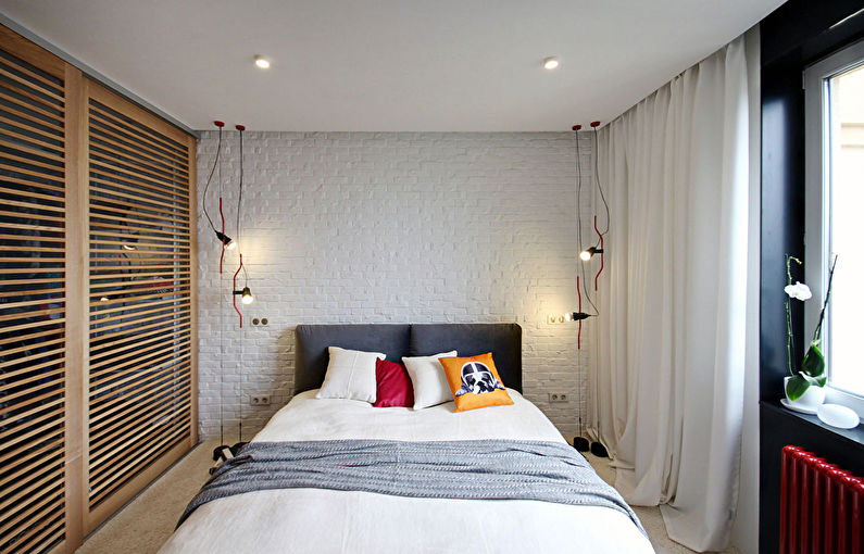 Design av ett litet sovrum i loftstil - foto