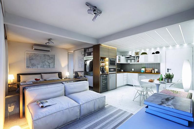 El diseño interior de un apartamento de una habitación de 30 metros cuadrados. - Foto
