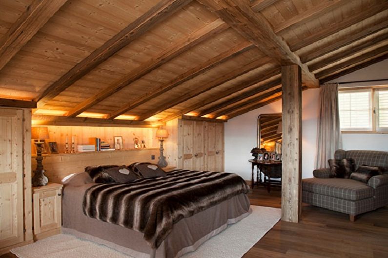 Dormitorio en el ático del chalet - Diseño de interiores