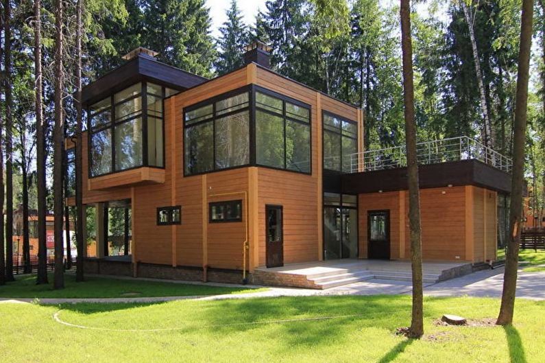 Case moderne din lemn cu acoperiș plat