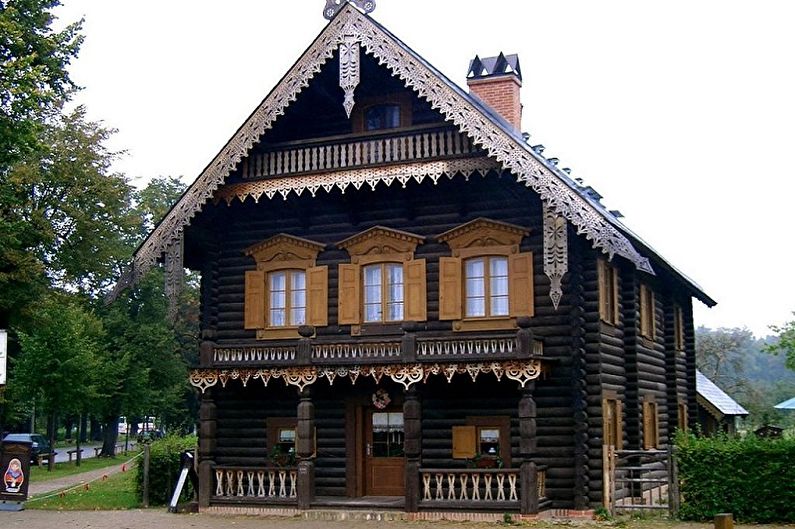 Moderne prosjekter av tømmerhus - Hus fra avrundede tømmerstokker med dekorative utskjæringer