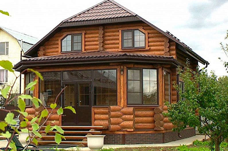 Projetos modernos de casas de toras - Casa de toras com varanda
