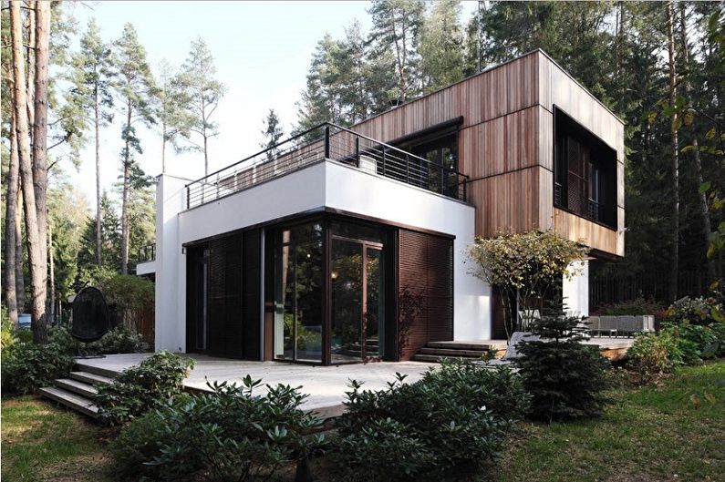 Nowoczesne projekty domów piętrowych - Dom piętrowy z płaskim dachem