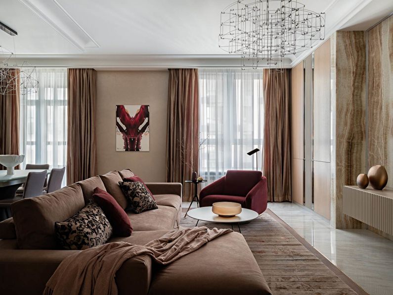 Sala de estar em tons de terra da moda com carpete de terracota ALDO