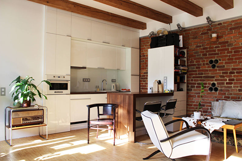 Oblikovanje kuhinje-dnevne sobe v slogu mansarde-fotografija