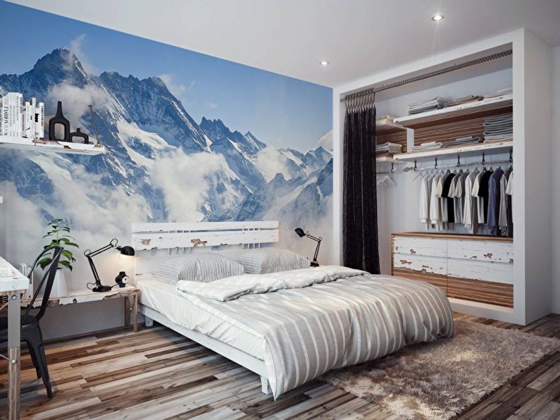 Papel de parede fotográfico com a imagem de montanhas no quarto