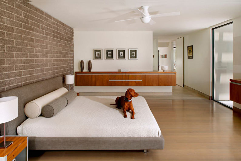 Tapet under en tegelsten i det inre av sovrummet - Fotodesign