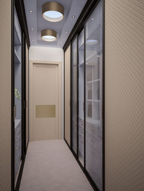 Podświetlane półki i szklane drzwi powiększają wąską przestrzeń