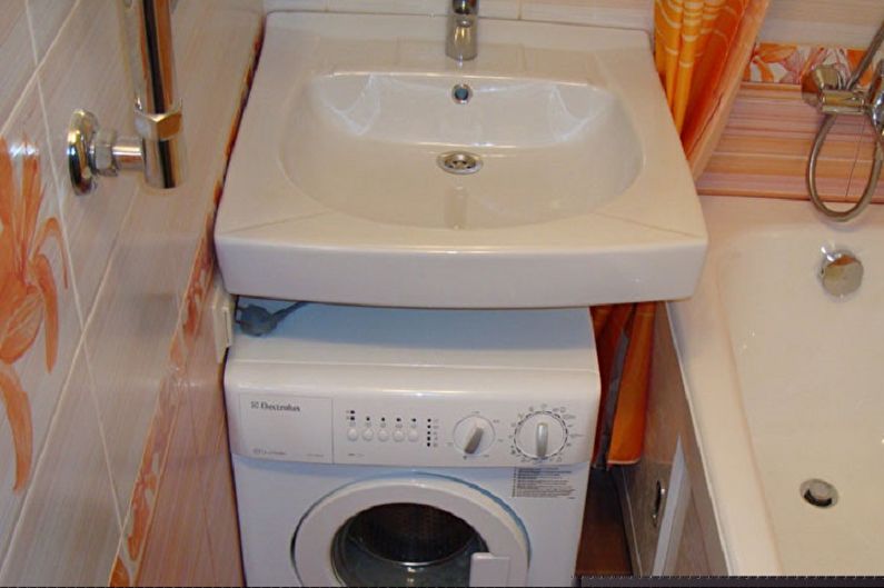 Umivalnik nad pralnim strojem - fotografija