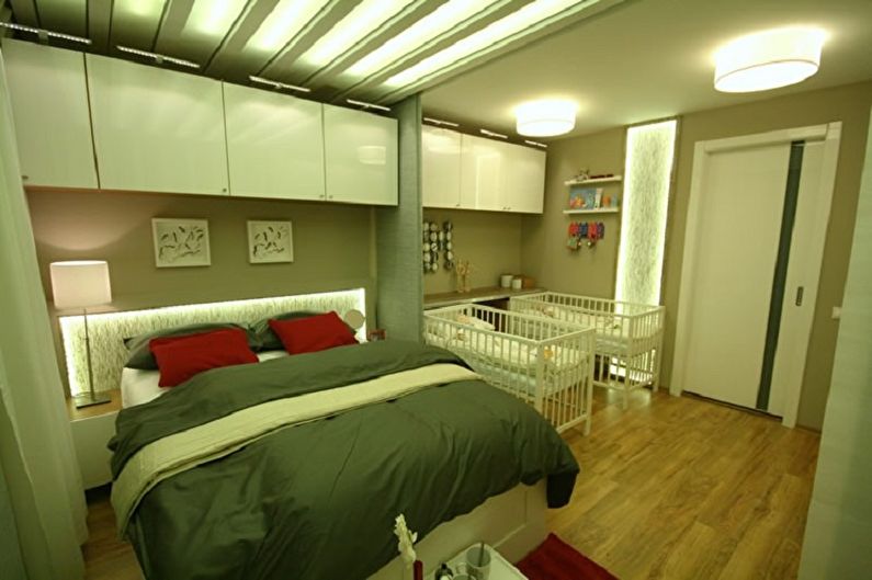 Inredning av ett sovrum och ett plantskola i ett rum - foto