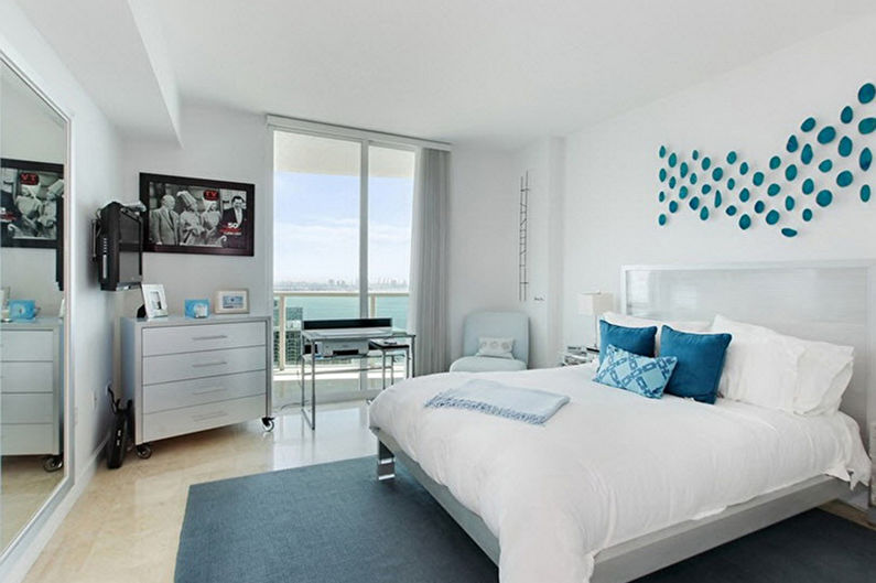 Niebieska sypialnia w stylu minimalizmu - Projektowanie wnętrz