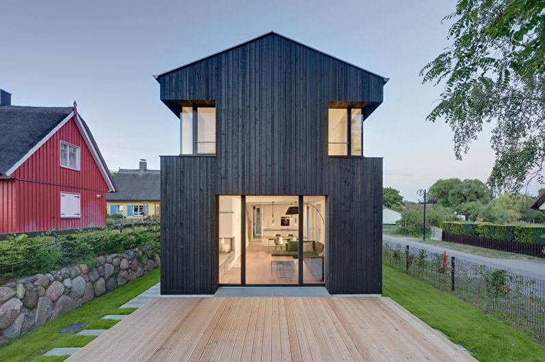 Casa de campo escandinava negra - foto